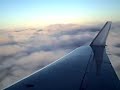 Canadair Jet climbing through clouds