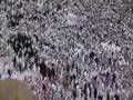 Hajj view of the Kaaba as pilgrims walk