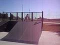 Ethan riding scooter at skate park