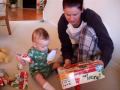 Ari opening Santas gifts...