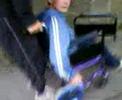Robbie in wheelchair Robbie in wheelchair