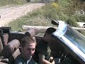 Jumping and trashing a lebaron convertible.
