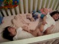 Twins K&K Playing in Crib