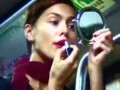 girl waxing / shaving on train