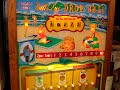 1959 chicago coin bull's eye drop ball shuffle alley arcade game. this video shows game play of this classic 10 cent arcade game. the cabinet and shuffle alley is in fantastic shape. the plexiglass backglass was poorly touched up in the 