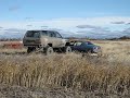 crawling an 85 toyota  4runner on top of a car in radisson near saskatoon. Karl Hamilton.AVI