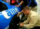 INFO's Josh Snow in AllTel's Tire Changing Contest