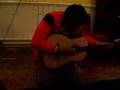 Fat kid brakdancing and playing guitar