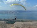 Pal Takats and Adam Vexler take off from Mevo Hama Sea of Gallily for D bag jumping.