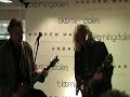 two guitar giants leslie west, of mountain and todd wolfe from sheryl crow, cut loose at a fundraiser in bloomingdales in nyc. 2007