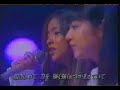 Kato Noriko with Namie Amuro Singing the song \"LOVE BRACE\"