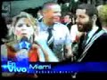 Paulina Rubio - Beso En El Cachete A Calle 13
