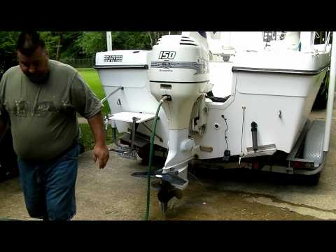 how to unclog outboard motor