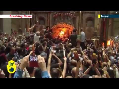 Holy Fire in Jerusalem: Orthodox Christians celebrate annual Easter miracle in Old City