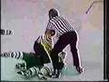 Great old hockey fight in which Bruins player John Wensink challeges entire Minnesota team