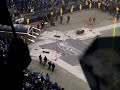 Packers take the field in the snow at Qwest