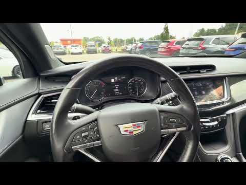 Used 2021 Black Metallic Cadillac Premium Luxury image 1