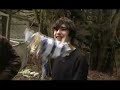 Kori chops down a Tree with a Cardboard Hammer