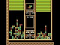 this is tetris 2 for the nes. as you can see, the gameplay differs from traditional tetris. from my own understanding, you connect at least 3 same-colored blocks. the 