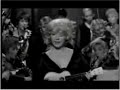 http://moneyreality.co.uk/
running wild performed by marilyn monroe in the train scene from some like it hot
