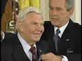 Muhammad Ali gives Bush the crazy sign Muhammad Ali gives Bush the crazy sign