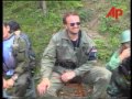 Bosnian Serb troops took the town of Srebrenica on Tuesday (11/7) shrugging off two strikes on their tanks by NATO aircraft, and driving 30000 mainly Moslem refugees out of the town under the noses of UN peacekeepers charged with protecting them. General Ratko Mladic, the commander of the Bosnian Serb army drove into the Srbrenica enclave as a conqueror on Wednesday to evacuate its Moslem population after screening them for 