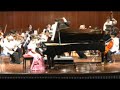 Inna plays Mozart piano concerto No. 19 in F Major, KV459