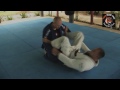 Andrew Gardineer shows a spider guard sweep in the BJJ Gi at Tiger Muay Thai