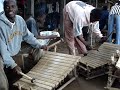 these are family members of the late gyil master kakraba lobi. they are birifor people from tuna in the northern region of ghana. this was filmed at their kiosk at the arts council on high street accra, ghana where they make and sell these xylophones.