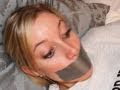 Girl Duct Taped To Bed