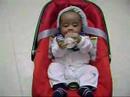Adam learning to hold his milk bottle :-) Adam learning to hold his milk bottle :-)
