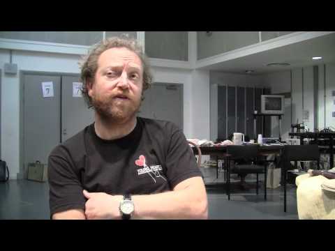 Screenshot from You Can’t Take It With You Interview with Paul Hunter and backstage rehearsal footage video