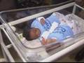 woman gives birth to black and white twin