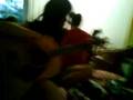 TRISH PLAYING THE GUITAR