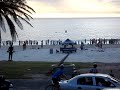Whales salute people on Camps Bay Beach South Africa
