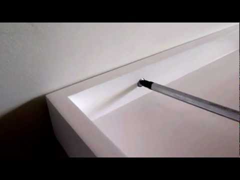 how to fit plasterboard to a wall