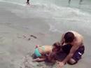 Lia making a sand castle