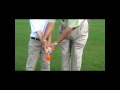 Gino instructing a young man with the SwingPRO (00:01:07)