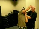 Krav Maga Choke from behind with a wire defense Krav Maga Choke from behind with a wire defense
