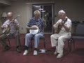 jim robinson (88) jams with henry fries, emmett stephenson, john stephenson, glen parks and an unidientified player at banjo international rally in eureka springs, 2001