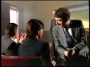 1990s ad for barclaycard. secret agent latham (rowan atkinson) comes unstuck when he demonstrates a dangerous spy gadget.

the man at 00:15 is derren litten, of 