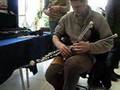 Tiarnan Duinnchinn playing an arhpa uilleann pipe 2