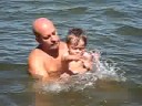 Joseph swimming with Poppy