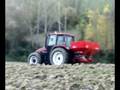 videos de NewHolland L85 con spandiconcime kuhn AXIS 30.1W