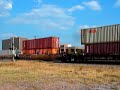 This particular video was definitely the catch of the day.  I initially heard an oncoming train from the West (on Main #2), which turned out to be a BNSF Intermodal being led by BNSF 106 (GP60M). After about one minutes of this train passing my observation point, I hear another horn from the west.  This turned out to be an eastbound rock train led by UP 1999 (GP60).  What made this train so great, was that it had NS 8910 (C40-9W) and UP 1900 (GP60, ex-Rio Grande, with UP patch).  I observed both of these engines the day before on a northbound manifest on the UP Duncan Sub.  This video was shot in downtown Arlington on the UP Dallas Sub, at the Center St crossing.