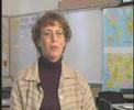 Teachers talk about the hand-held microscope (lg)