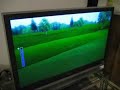 LOL at little girl playing wii golf