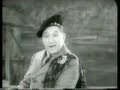 the scottish comedian rattles through his music-hall routine.