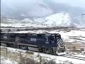 Here's something for those people waiting for the winter months: A trio of BC Rail B39-8E's rock the peaceful snowy town of Lillooet and take on the challenging, icy grade towards Kelly Lake. This was filmed in the winter of 2004 while CN was experimenting with these 4-axle GE units. Before the sale to CN, BCR kept these units for operations north of Prince George, BC. Double Ditch Light Productions.