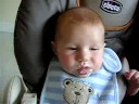 Nate eating rice cereal for the first time